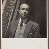 Snapshot of Raphael Patai leaning against wall