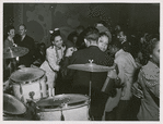 View of crowd dancing to the music of "Red" Sounders and his band, at the Club DeLisa, Chicago, Illinois, April 1942