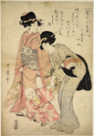 Two women walking with a small boy