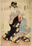 Portrait of the Tayu Karauta of Chojiya, holding in her hands a bouncing ball used in one of the New Year's Day games