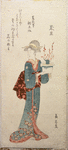 Woman holding flower arrangement
