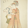 Woman holding flower arrangement