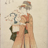 Woman holding flower arrangement