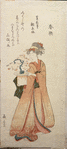 Woman holding flower arrangement