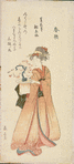 Woman holding flower arrangement