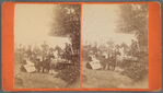 Group portrait with people seated at table and men on horses, Steubenville, Ohio