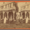 Group portrait of three men and two women in front of a house, Steubenville, Ohio