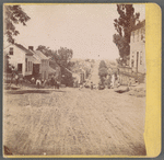 Street view of dirt road flanked by houses on each side, Richmond, Ohio