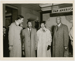 Dr. Martin Luther King, Jr. and his wife Coretta being greeted by Rev. Adam Clayton Powell, Jr. (left) and labor leader A. Philip Randolph (right) at the Pan American World Airways terminal, in New York City