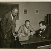 Dr. Martin Luther King, Jr. (center) being interviewed by actor and activist Harry Belafonte (right), and George Goodman, community news director at WLIB radio, New York