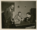 Dr. Martin Luther King, Jr. (center) being interviewed by actor and activist Harry Belafonte (right), and George Goodman, community news director at WLIB radio, New York