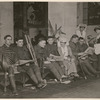 Daisy Humphreys handing out newspapers to soldiers in hospital