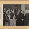 In a corner of the church during Easter Mass, under a banner reading “Sisterhood of the Virgin Mary”, Gypsies stand with unaccustomed reverence, to watch proceedings