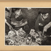 Roma children eating baked beans