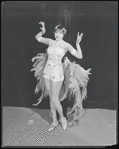 Publicity photograph of Adelaide Hall in feather costume for the stage production Blackbirds of 1928