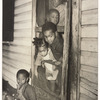 African American children in the front door of their home, Washington, D.C.