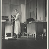 Mrs. Ella Watson, a government charwoman, cleaning an office