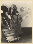 With Alice B. Toklas before their first air journey with fetishes presented them by Carl Van Vechten