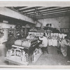 Workers backstage in the Princess Theatre painting wooden soldiers for the stage production Chauve-Souris