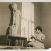 Child musical prodigy Philippa Duke Schuyler with a portrait sculpture, modeled after her by Augusta Savage