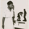 Augusta Savage with two of her statuettes, entitled (left to right) “Susie Q” and Truckin’” 