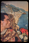 Hugh Laing in improvised costume with Amalfi poster