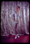 Ian Gibson in white costume of "Princess Aurora"