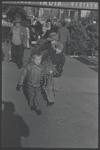 Children with Christmas tree. New York, NY