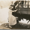 Florence Deshon boarding a trolly car