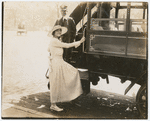 Florence Deshon boarding a trolly car