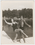 Jerome Robbins and sister Sonia dancing on Lake pier in swimsuits