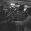 Camera and lights with costumed people