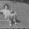 Boy playing on lawn