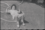 Boy playing on lawn