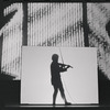 Laurie Anderson (silhouette) in the stage production Empty Places during BAM Next Wave Festival, 1989