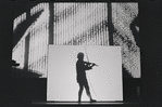 Laurie Anderson (silhouette) in the stage production Empty Places during BAM Next Wave Festival, 1989