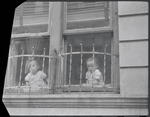 Children at window. New York, NY