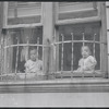 Children at window. New York, NY