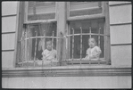 Children at window. New York, NY