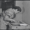 Woman making pottery