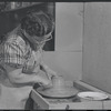 Woman making pottery