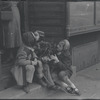 Children with puppy. New York, NY