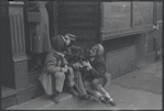 Children with puppy. New York, NY