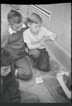 Boys playing cards. New York, NY