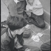 Boys playing cards. New York, NY