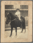 Jerome Robbins riding a horse