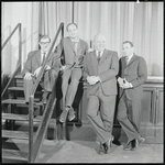 Publicity photograph of Charles Strouse, Lee Adams, unidentified man and Mel Brooks during rehearsal for the stage production All American
