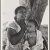 Mexican mother in California. "Sometimes I tell my children that I would like to go to Mexico, but they tell me 'We don't want to go, we belong here.'" (Note on Mexican labor situation in repatriation)
