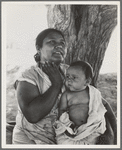 Mexican mother in California. "Sometimes I tell my children that I would like to go to Mexico, but they tell me 'We don't want to go, we belong here.'" (Note on Mexican labor situation in repatriation)