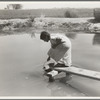 Drinking water for field worker's family. Imperial Valley, California, near El Centro